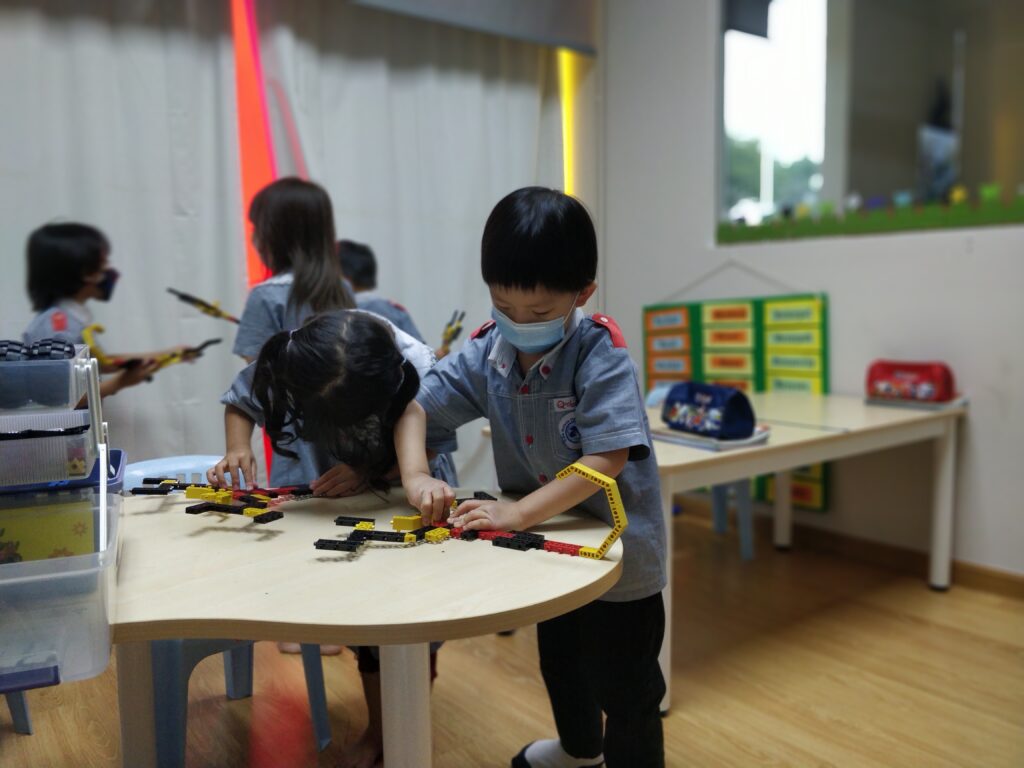 Boy working on robotics at afterschool program